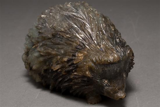 Appraisal: Continental carved hardstone hedgehog with jeweled eyes th century in