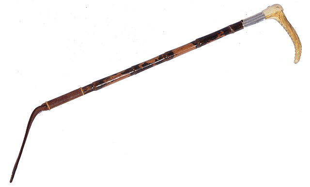 Appraisal: A SWAINE CO LONDON RIDING CROP with carved antler handle