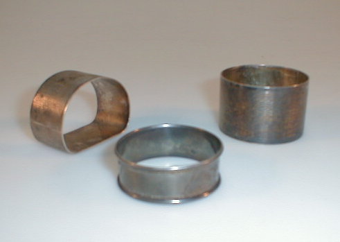 Appraisal: Three engine turned silver napkin rings