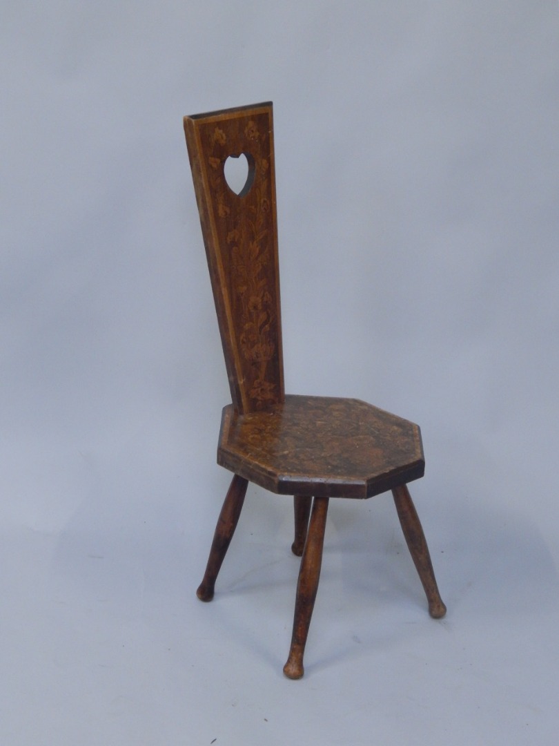 Appraisal: An early thC poker work hall type chair the tapering