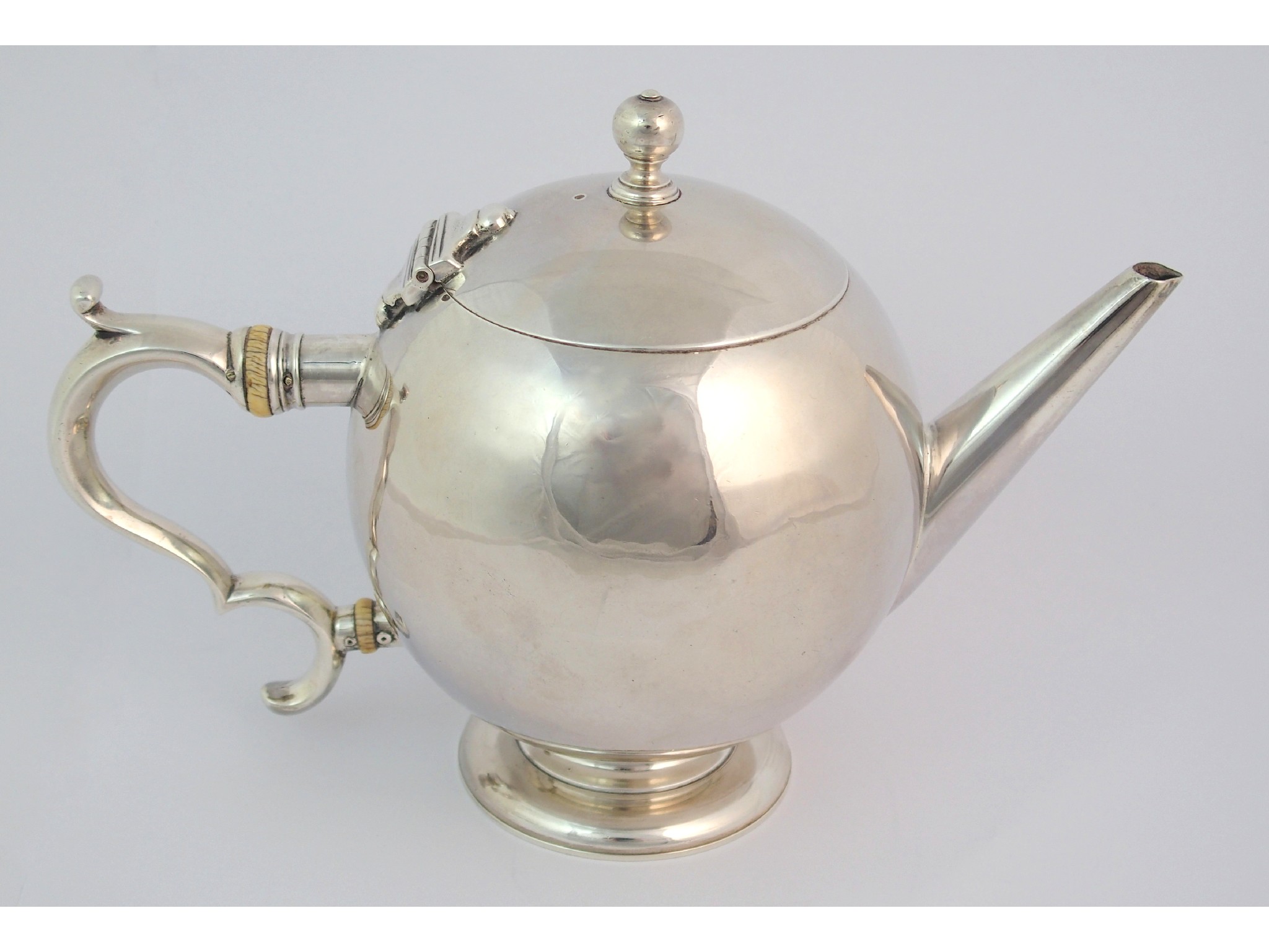 Appraisal: A silver teapotby Crichton Brothers Lionel Alfred Crichton London of