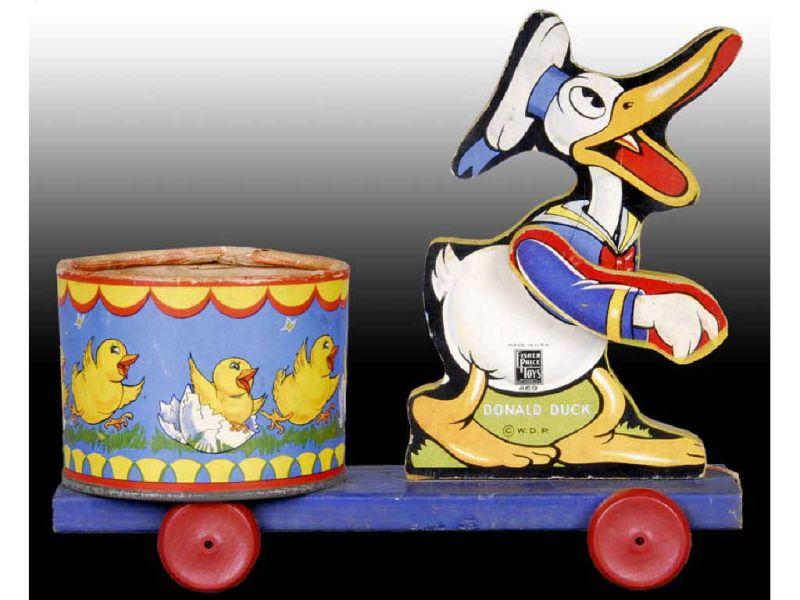 Appraisal: Fisher-Price - Donald Duck Chick Cart Toy Description '' L