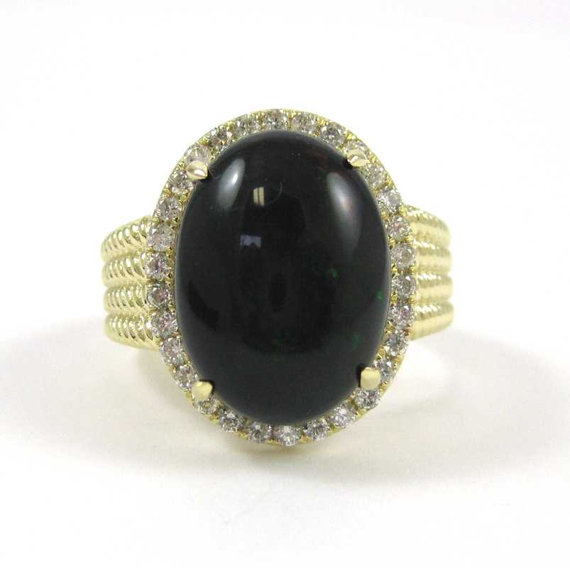 Appraisal: BLACK OPAL DIAMOND AND FOURTEEN KARAT GOLD RING with round-cut