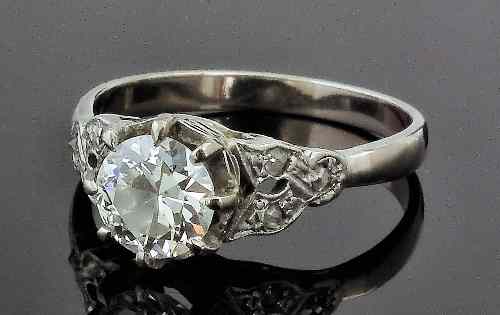 Appraisal: A s silvery coloured metal mounted diamond solitaire ring set