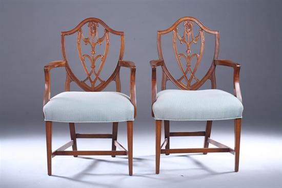 Appraisal: PAIR GEORGIAN STYLE SHIELD-BACK ARM CHAIRS th century Arching crest