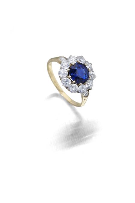 Appraisal: An ct gold mounted sapphire and diamond floral cluster ring