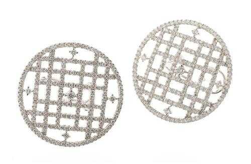 Appraisal: BRILLIANT-CUT DIAMOND CLIP EARRINGS White gold Decorative round clip stud