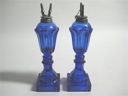 Appraisal: Pair of cobalt blue pressed loop pattern fluid lamps boston