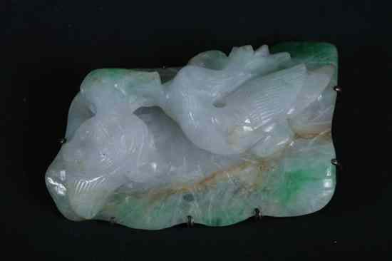 Appraisal: CHINESE APPLE GREEN AND CELADON JADEITE BROOCH Carved to depict