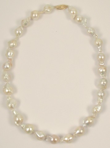 Appraisal: PEARL AND FOURTEEN KARAT GOLD NECKLACE - in length and