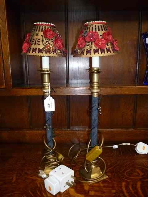 Appraisal: A PAIR OF BRASS AND FRUITING VINE DECORATED TABLE LAMPS