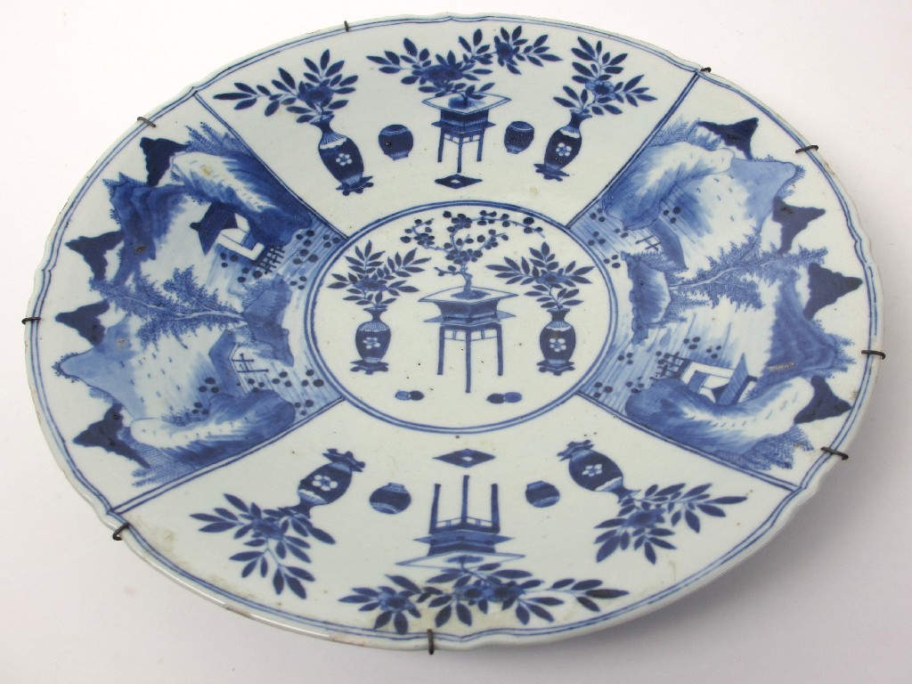 Appraisal: A Chinese blue and white dish painted with panels of