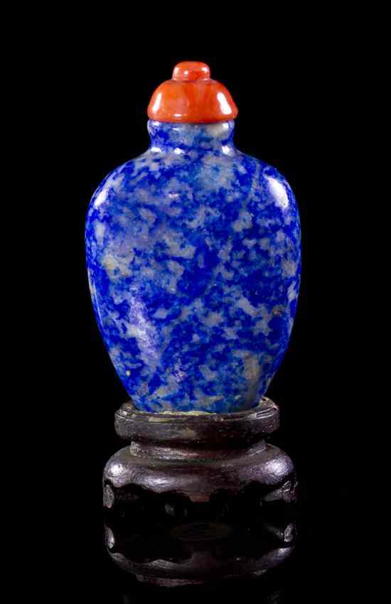 Appraisal: A Lapis Lazuli Lady's Snuff Bottle of compressed flask form