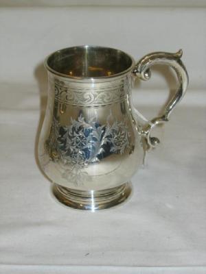 Appraisal: A VICTORIAN MUG of baluster form with leaf capped double