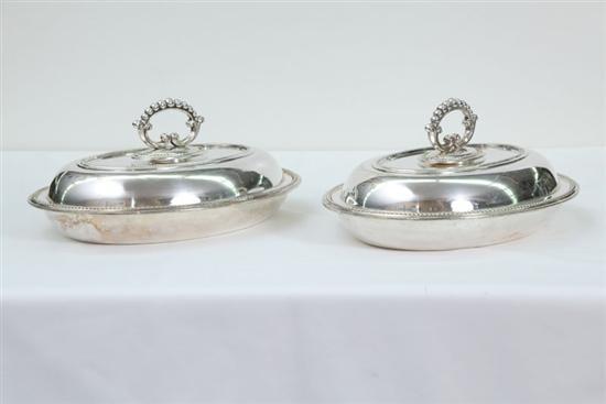 Appraisal: PAIR OF SILVERPLATE COVERED VEGETABLE DISHES Oval with beeded decoration