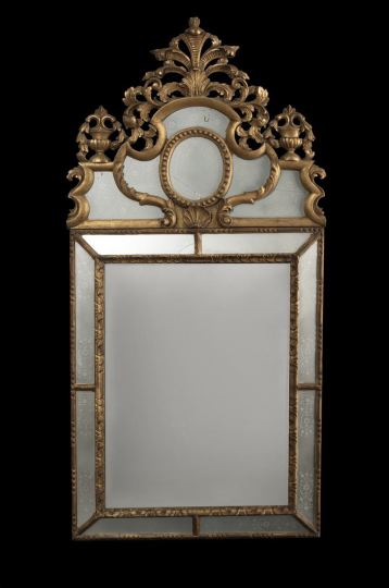 Appraisal: Italian Giltwood Looking Glass early th century in the Baroque