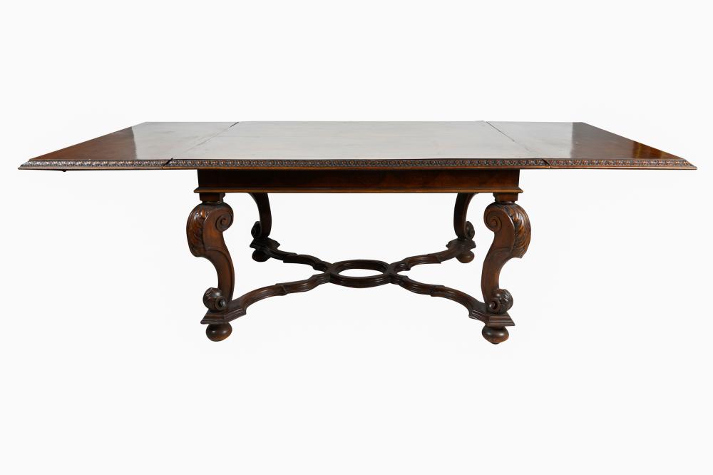 Appraisal: BAROQUE STYLE DINING TABLEcarved walnut with draw leaf inches wide