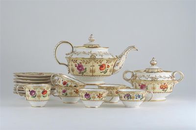 Appraisal: A Coalport part tea service decorated with colourful flowers on