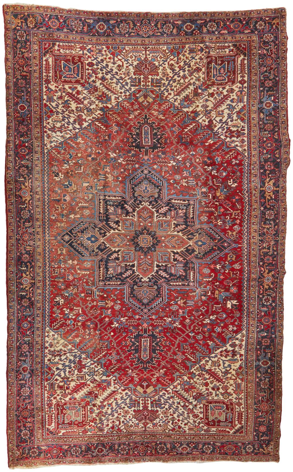 Appraisal: A Persian Heriz rug First-quarter th Century Wool on cotton