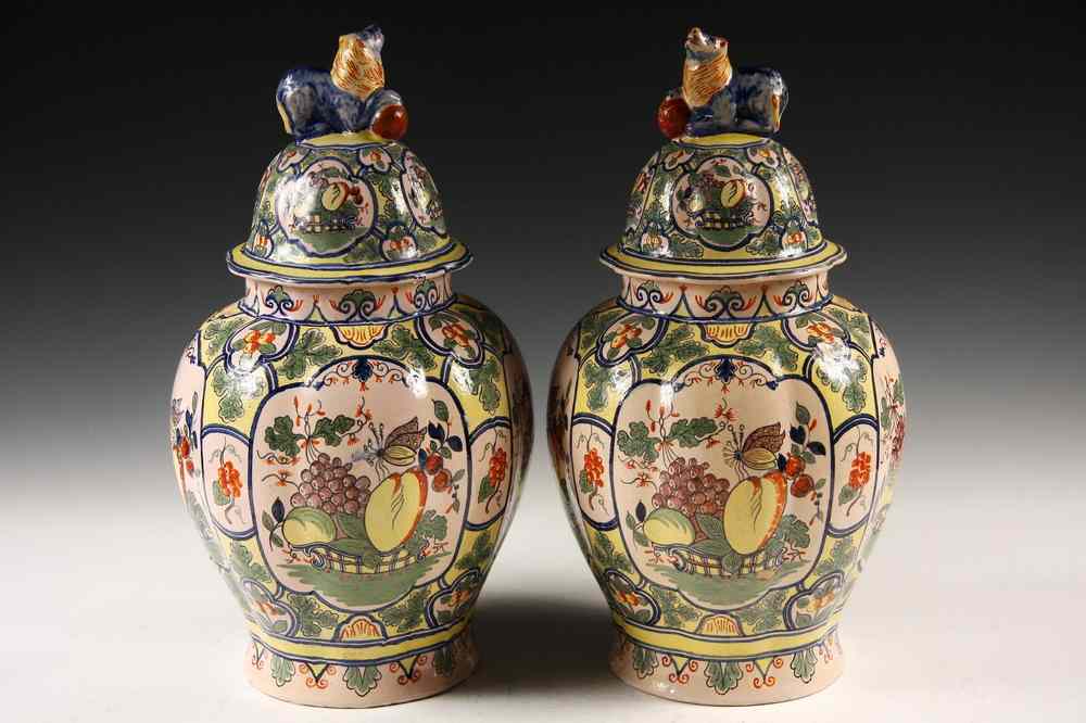 Appraisal: PAIR COVERED DELFT URNS - Large th c Delft Polychrome