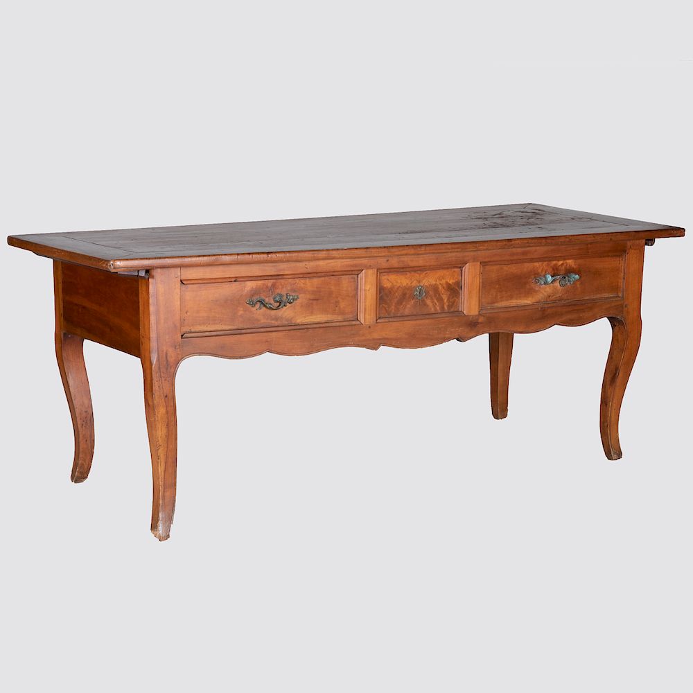 Appraisal: French Provincial Fruitwood Table With three false frieze drawers x