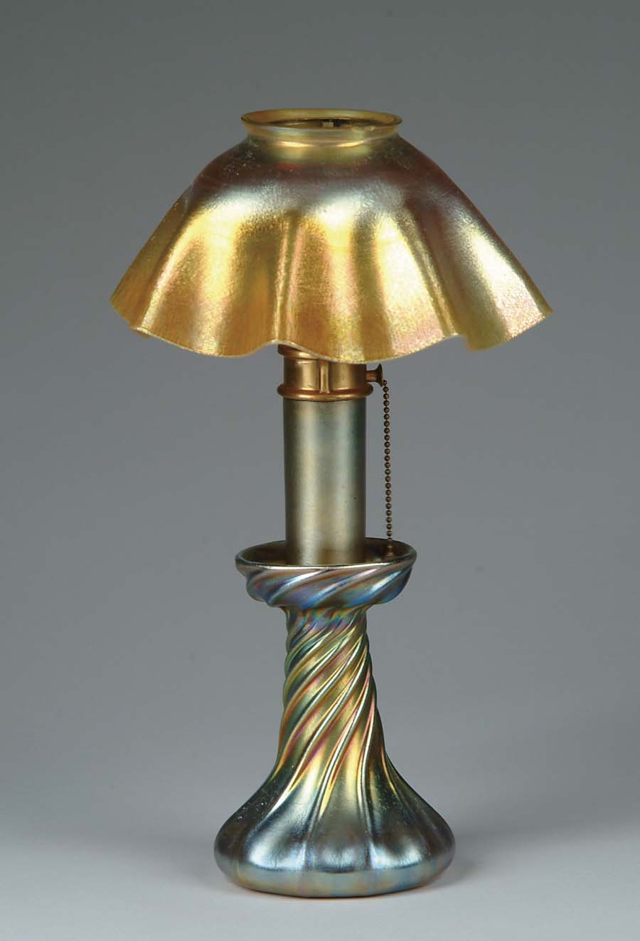 Appraisal: TIFFANY CANDLE LAMP Beautiful Tiffany electric candle lamp has gold