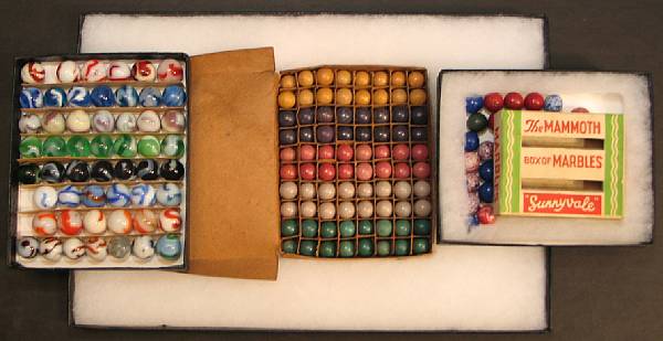 Appraisal: Grouping of Wood marbles and boxes Boxed Cooper Buffalo Marbles