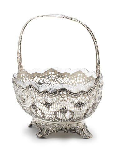 Appraisal: A late th early th century German silver swing-handled basket