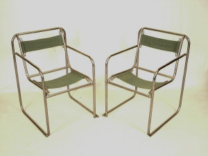 Appraisal: A pair of Modernist armchairs by PEL GB circa constructed