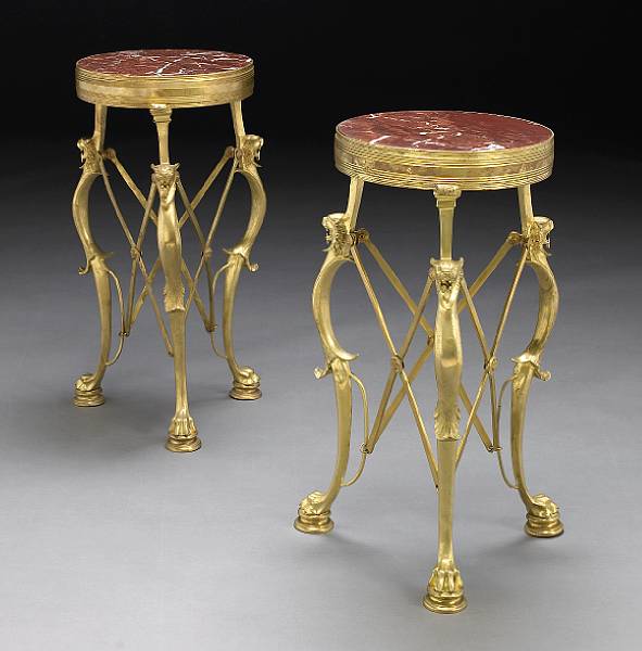 Appraisal: A pair of Pompeiian style gilt bronze and marble gueridons