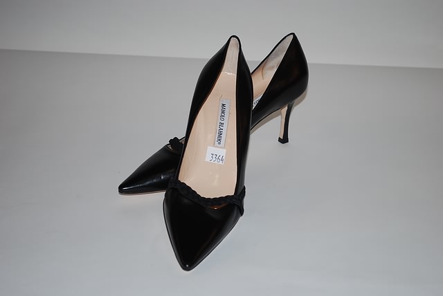 Appraisal: Manolo Blahnik black leather pumps w braid trim Size -