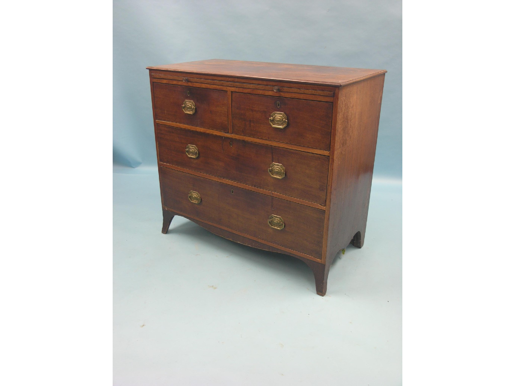 Appraisal: A th century mahogany chest brushing slide above two short