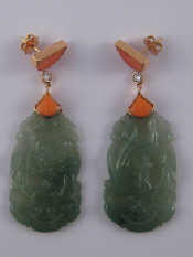 Appraisal: A pair of yellow metal tests carat gold carved jade