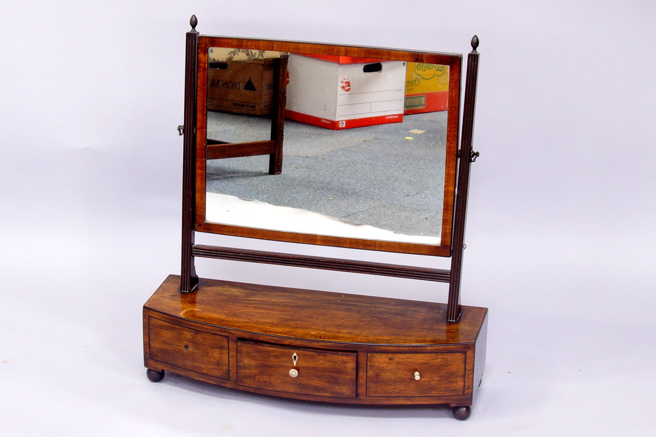 Appraisal: A George III mahogany dressing table mirror with rectangular plate