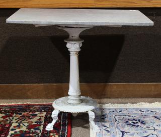 Appraisal: Cast iron table having a rectangular gray stone top on