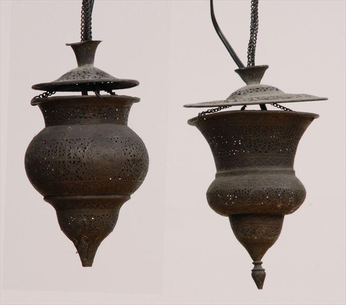 Appraisal: TWO NEAR EASTERN ENGRAVED AND PIERCED METAL HANGING LAMPS and