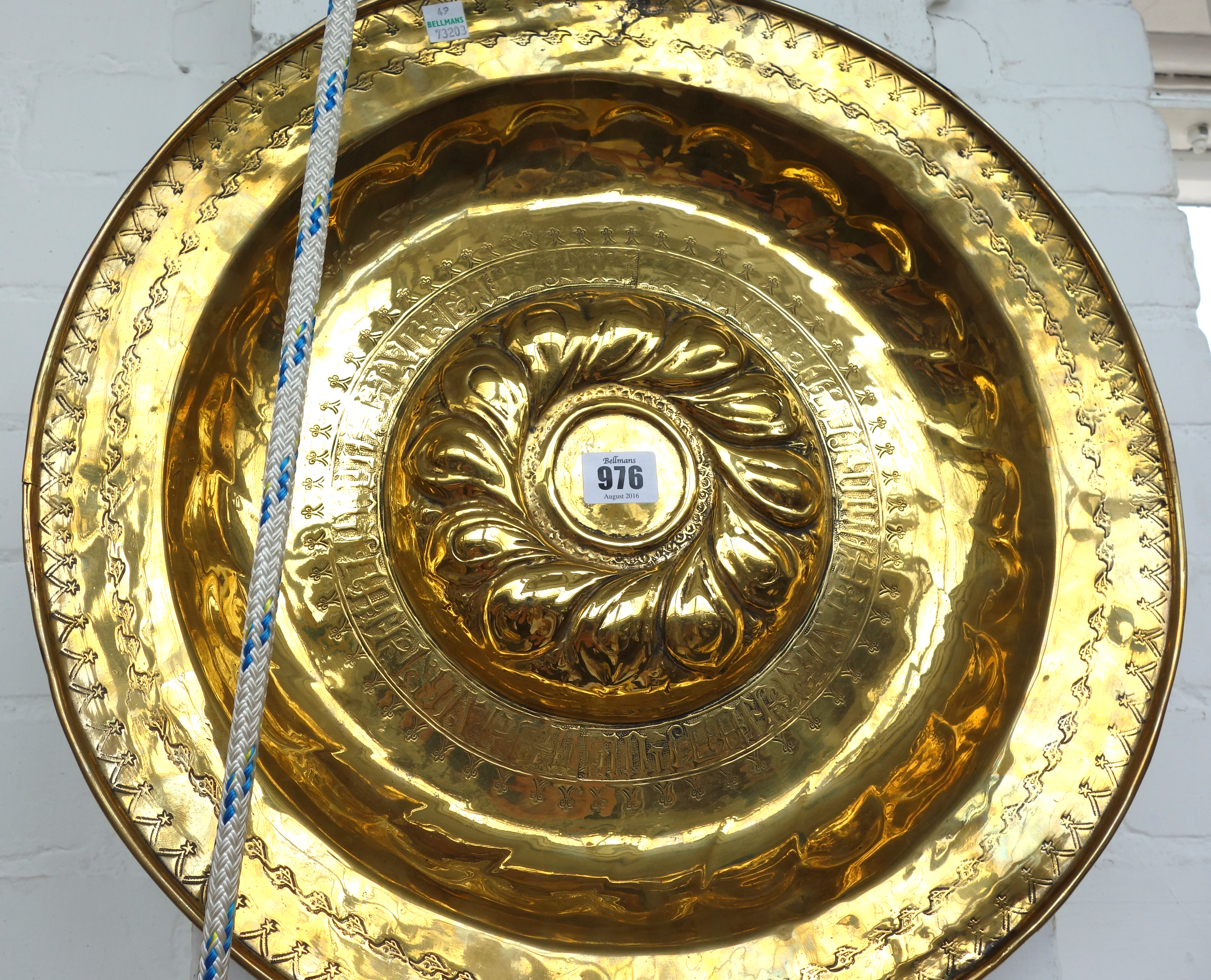 Appraisal: A Nuremberg brass alms dish th century with a central