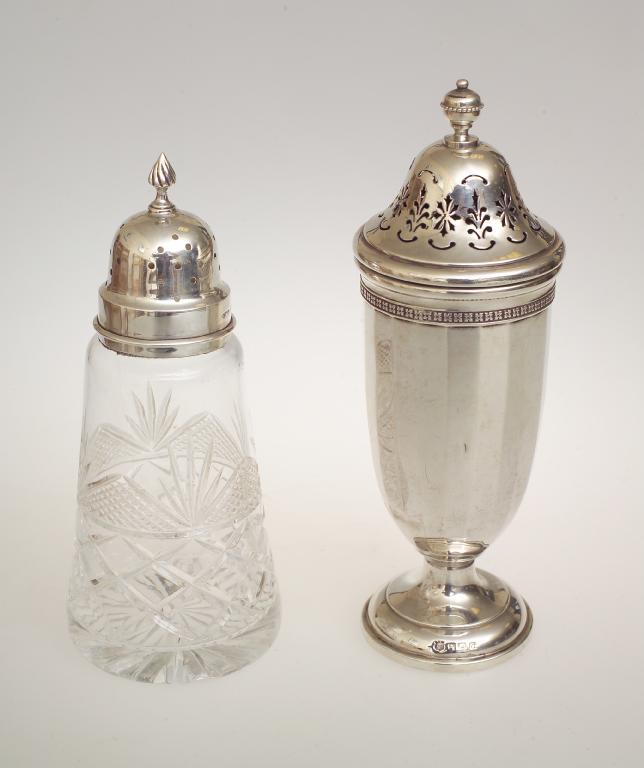 Appraisal: GEORGE V SILVER SUGAR CASTER BIRMINGHAM with faceted body and