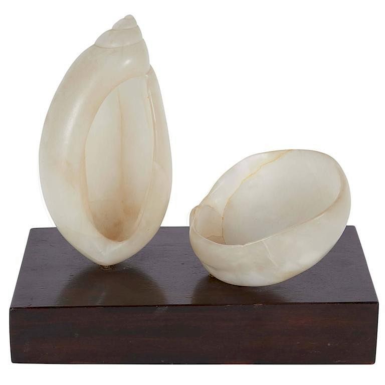 Appraisal: Mid-Century Carved Alabaster Shell-Form Sculpture Two carved alabaster seashell-form sculptures