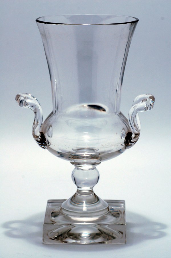 Appraisal: Clear glass vase urn form with two applied handles atop