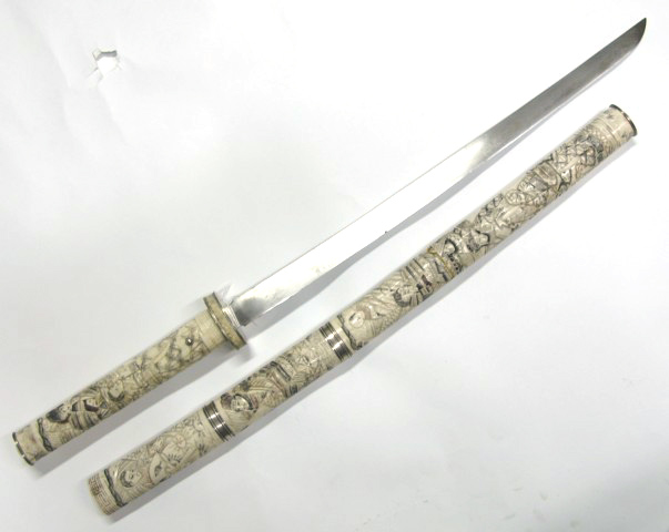 Appraisal: JAPANESE SAMURAI STYLE SWORD IN BONE SHEATH slightly curved blade