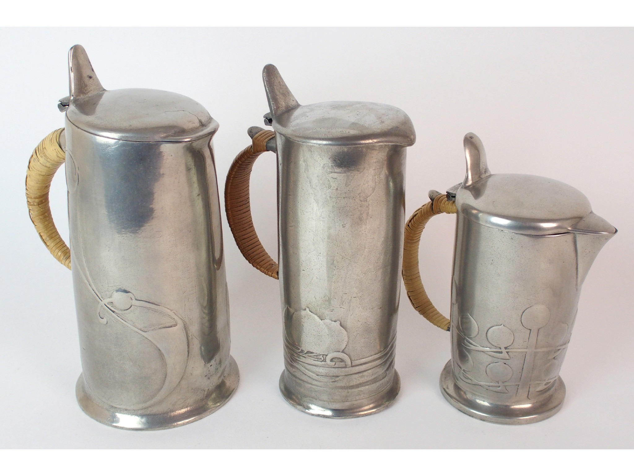 Appraisal: Archibald Knox for Liberty Co Tudric Pewter hot water pots