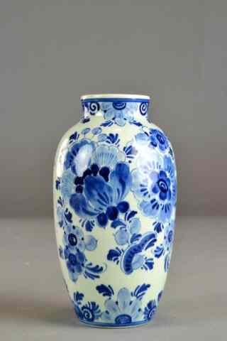 Appraisal: DELFT VASE WITH FLORAL DESIGNPorcelain narrow neck vase w floral