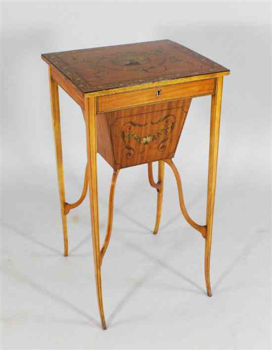 Appraisal: An Edwardian painted satinwood work table on tapered square legs