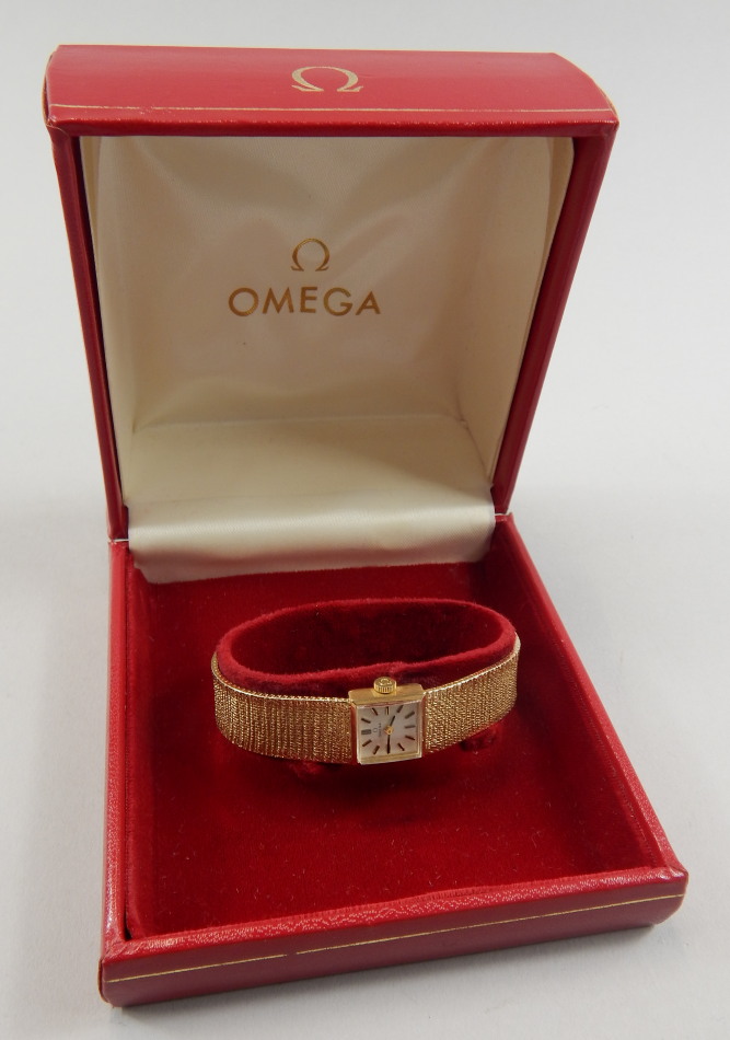 Appraisal: A ct gold Omega ladies wristwatch the square shaped dial