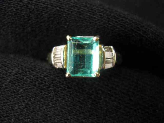 Appraisal: Emerald Diamond Ring emerald cut gem totaling carat with baguette