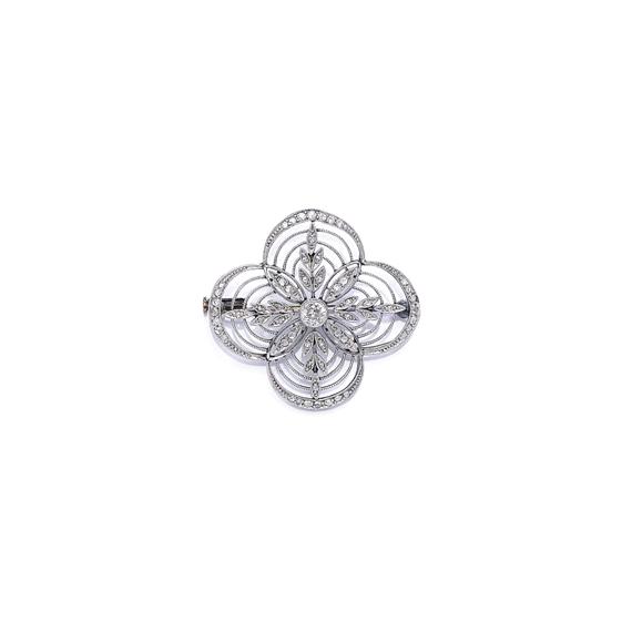 Appraisal: A DIAMOND BROOCH circa Platinum Decorative quadrifoil stylized brooch of