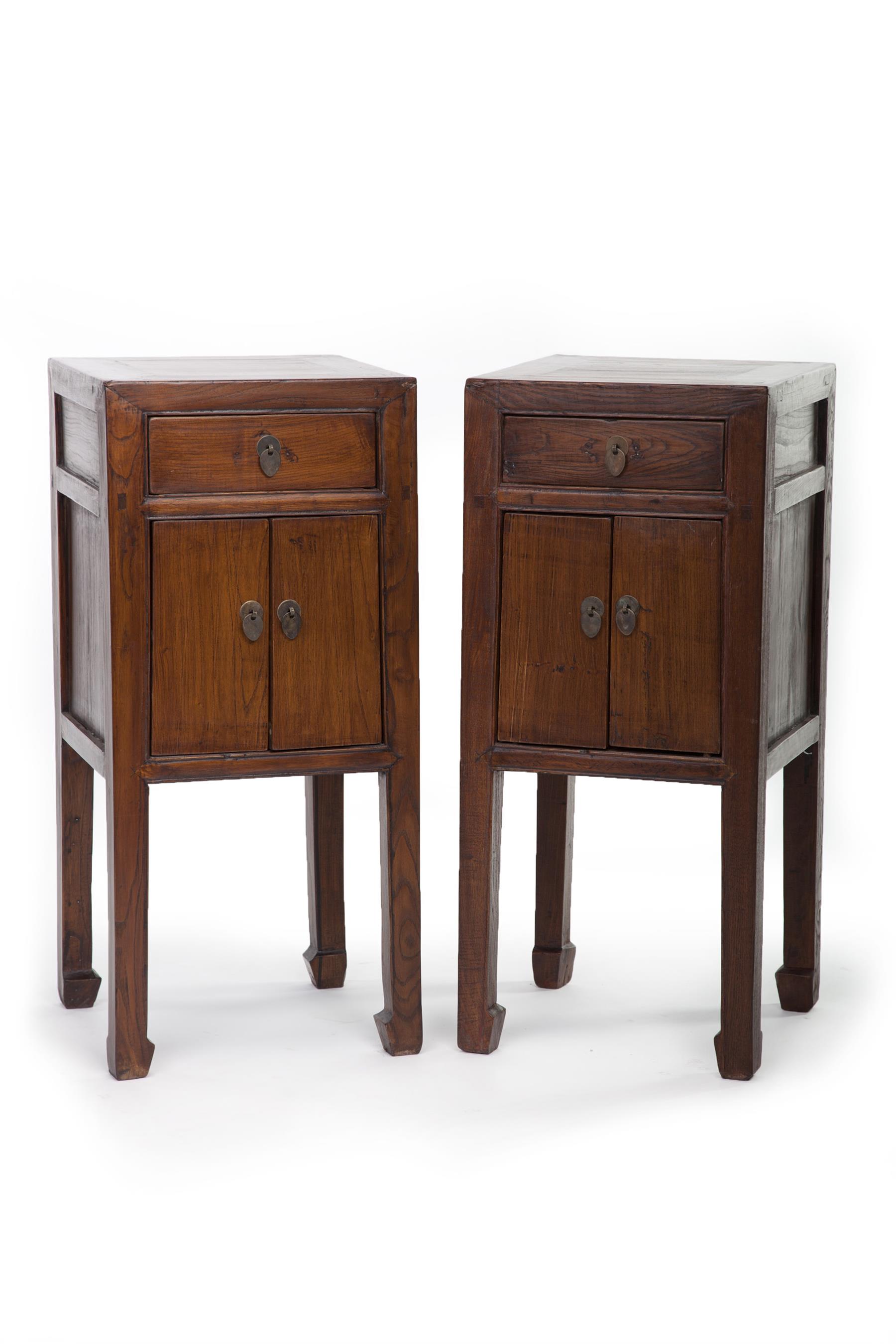 Appraisal: PAIR OF CHINESE END CABINETS Twentieth century elm Mortised construction