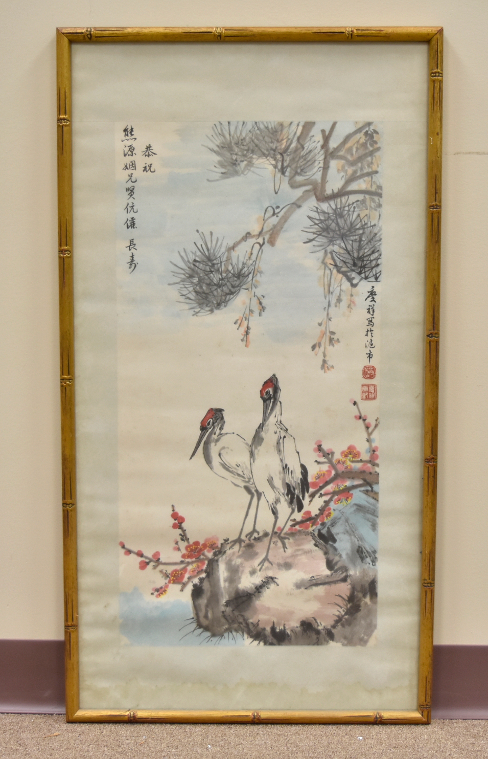 Appraisal: painting of cranes perched on rockwork with trees and flower