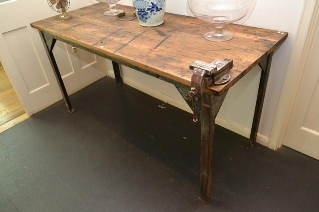 Appraisal: AN INDUSTRIAL TIMBER AND IRON BENCH WITH VICE FROM ARMY